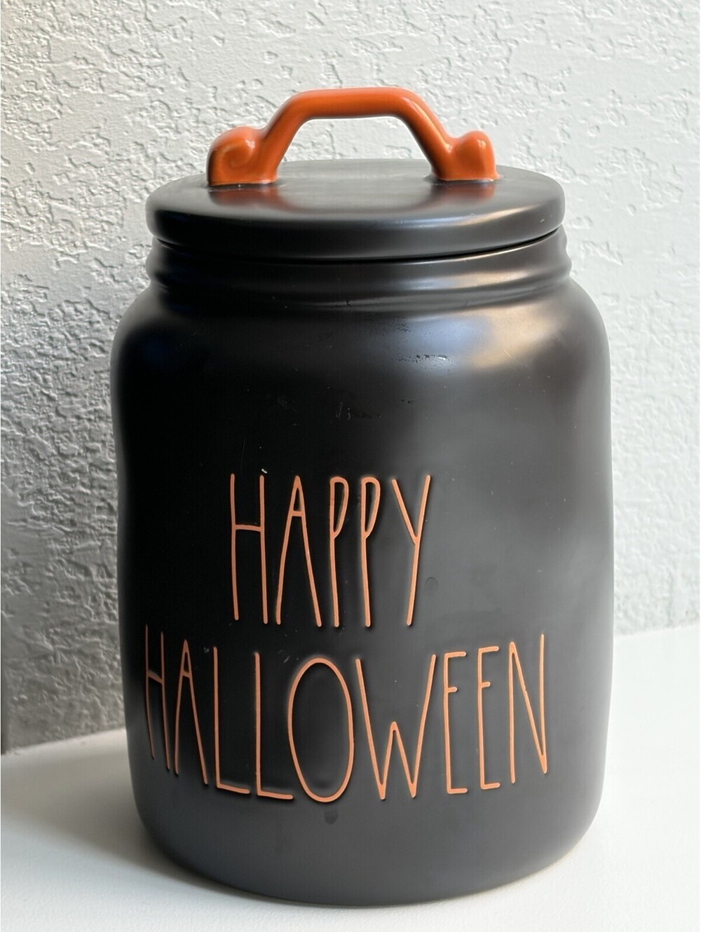 Rae Dunn Black Canister With Orange Handle “Happy Halloween” in Orange